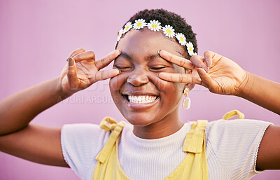 Buy stock photo Black woman, face and peace sign on the eyes on a stylish, trendy pink studio background. Hand gesture, excited female hippie and symbol with happiness, fun and joy in a cool outfit looking elegant