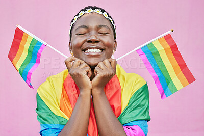 Buy stock photo Pride, lgbtq and black woman with flags in studio for queer rights. Freedom, homosexual and face of happy, lesbian or bisexual female from Nigeria with rainbow flag showing support for gay community.
