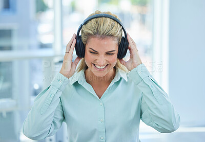 Buy stock photo Business woman, headphone and listening to music, podcast and streaming on break in the office with happy smile. Female employee listen to audio, happiness and smiling while enjoy time off from job