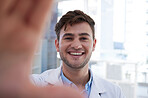 Hospital, doctor and selfie of man in office with optimistic and happy smile for career opportunity. Healthcare, happiness and professional medical person at workspace in Vancouver, Canada.