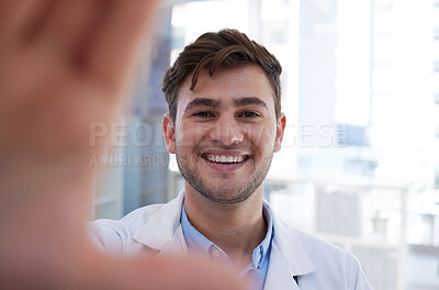 Buy stock photo Hospital, doctor and selfie of man in office with optimistic and happy smile for career opportunity. Healthcare, happiness and professional medical person at workspace in Vancouver, Canada.