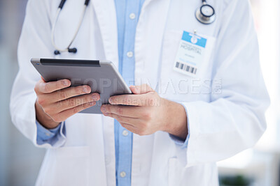 Healthcare, technology and hands of doctor with tablet online to review patient report, results and diagnosis. Medical worker with digital tech for insurance in hospital, clinic or health facility