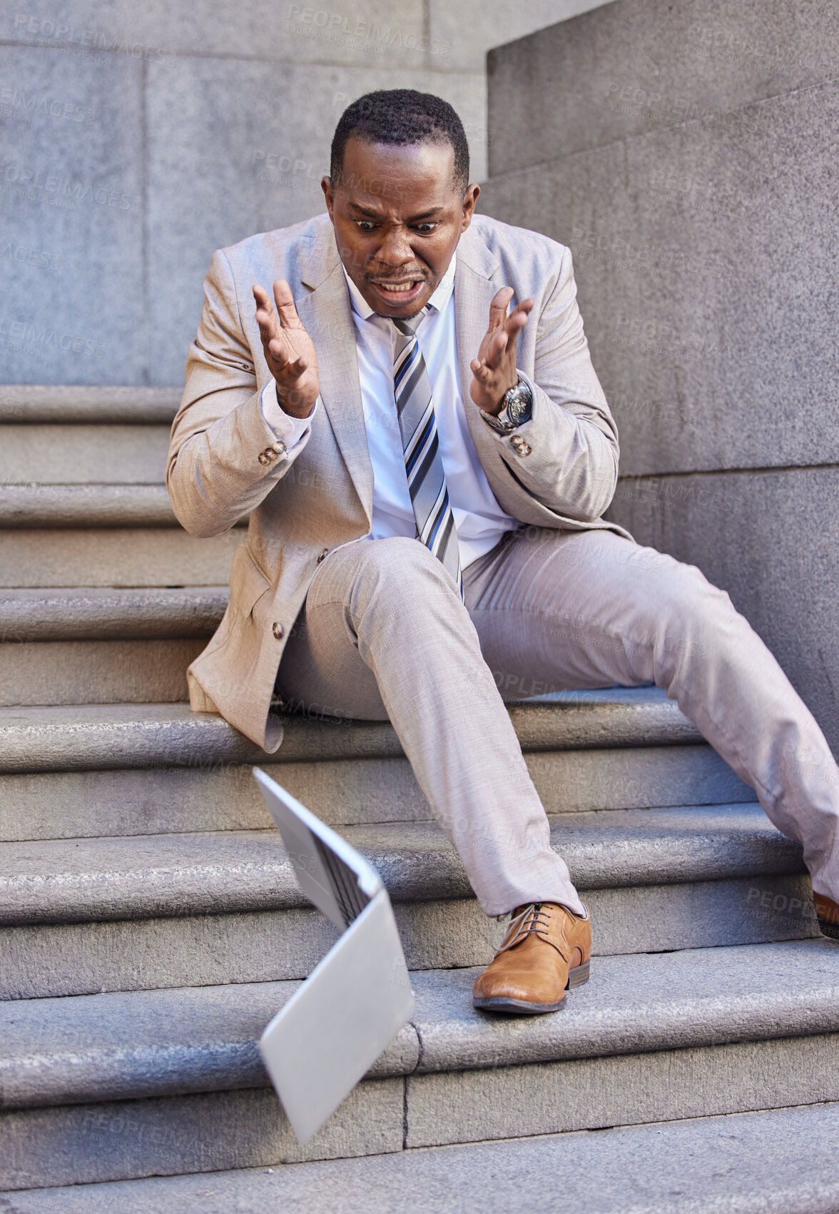 Buy stock photo Businessman, laptop and mistake with damage, drop and fail while typing or reading email outdoor in the city. Black man, pc or technology with disaster, broken and accident crash on steps in New york