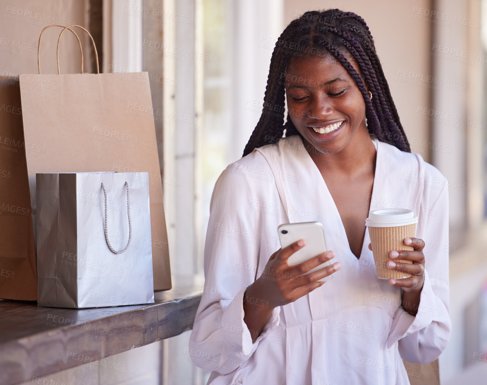 Buy stock photo Black woman with smartphone on coffee break after shopping, retail and excited about sale, communication and technology with shopping bags. Discount, bargain and after shop coffee with phone and app.