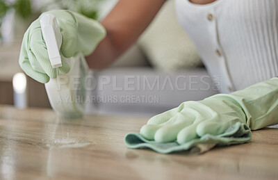 Buy stock photo Woman, spray bottle and sanitizer cleaning with a cleaner wiping a table surface with a cloth or rag in the home. Hands, spraying and disinfectant with a female clean bacteria and house work on desk