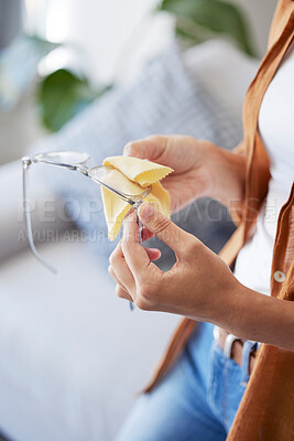 Buy stock photo Woman, hands and cleaning glasses for dust, dirt and protection with fabric tissue. Closeup female with microfiber cloth for spectacles, frames and eyewear for clear vision, reading and lens eye care