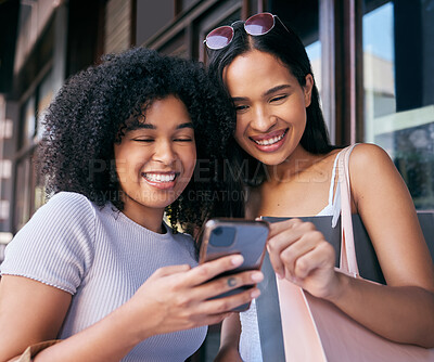 Buy stock photo Women, phone and online shopping in Cape Town street, read ecommerce website on retail shopping app in city. Happy friends, black woman and mobile tech, customer or promo notification on smartphone 