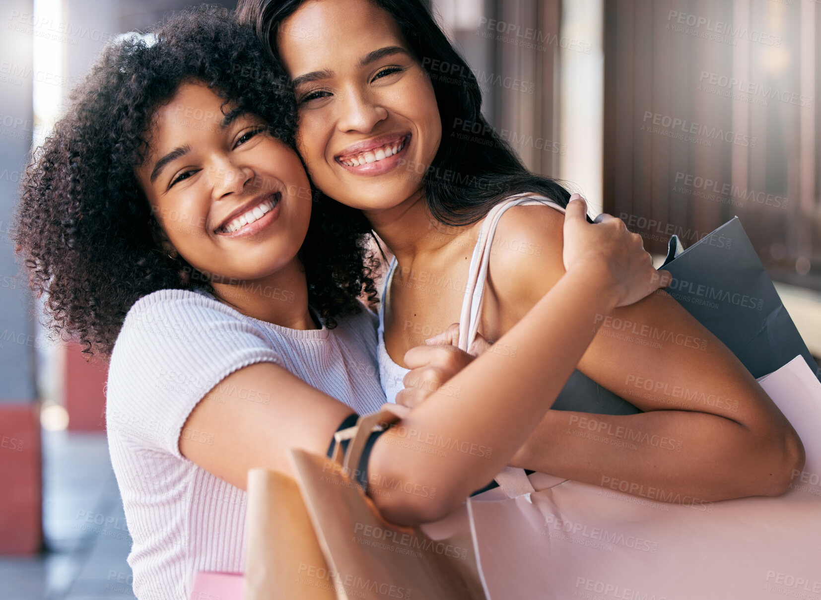 Buy stock photo Happy, friends and hug portrait with shopping bag products for boutique purchase fun in New York, USA. Smile, care and appreciation in women friendship with black people enjoying shopping spree.

