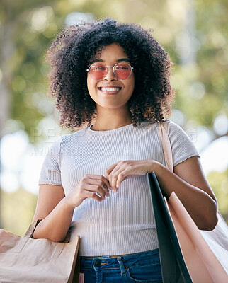 Buy stock photo Woman, shopping and bags outdoor for expensive purchase and buying items. Young black woman, customer or female shopper with clothes, boutique products and spending for retail therapy, smile or relax