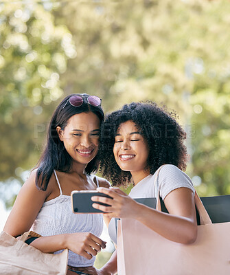 Buy stock photo Friends, phone and selfie for retail shopping bonding moment together with smile for purchase choices. Black people, shopper and smartphone photograph of happy gen z women for social media.

