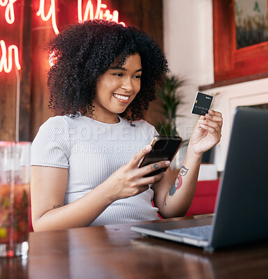Buy stock photo Credit card, phone and woman on laptop in cafe online shopping, ecommerce website payment for fashion sale. Black woman, retail customer and smartphone bank app or internet finance in coffee shop
