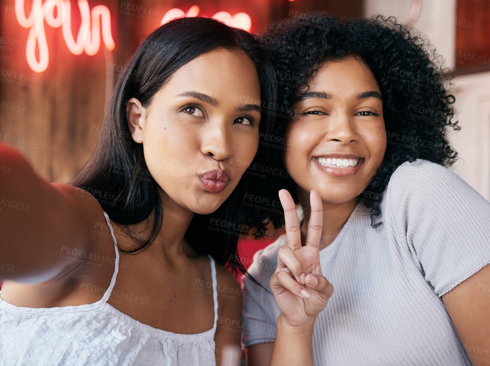 Buy stock photo Black women, peace and sign with selfie in cafe, celebrate and party. Friends, girls and females with hand gesture, happy hour and restaurant to relax, happiness or bonding for weekend break or smile