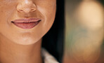 Woman, mouth and macro of face, lips and skin for beauty, cosmetics and makeup mockup while indoor with a smile, happiness and positive energy. Zoom of female with a glow from natural skincare 