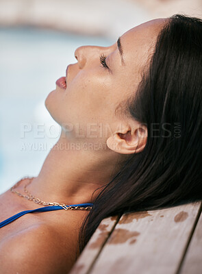 Buy stock photo Closeup, head and woman in pool, summer and cool off for holiday, calm and chill. Young Hispanic female, girl and relax for vacation, luxury and wellness for weekend break, tanning and spa for peace 