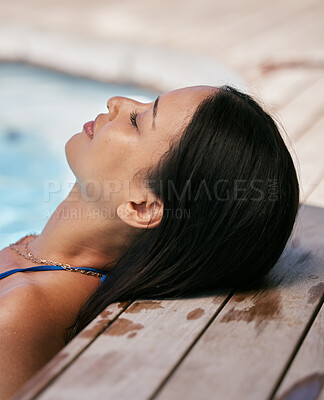 Buy stock photo Head, relax and pool with a black woman resting in the water during summer vacation or holiday alone. Luxury, swimming pool and wellness with a female tourist enjoying travel or relaxation outdoor