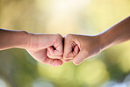 Fist bump, support and teamwork for collaboration, motivation or trust for project. Hands of friends, greeting and meeting for goal, success or celebrate for solidarity, partnership strategy or power