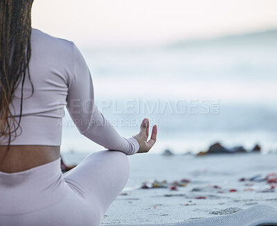 Buy stock photo Beach, yoga and lotus with black woman in meditation for calm, peace and zen with fitness, training and workout mockup. Ocean, waves and woman meditate on sand at sea for holistic exercise in nature