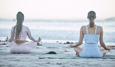 Buy stock photo Beach, wellness and friends doing a yoga exercise for outdoor mind, body and spiritual wellness. Zen, lotus pose and peaceful women doing a pilates or meditation workout together in nature by ocean.