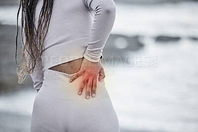 Buy stock photo Back pain, red and hand for fitness massage at beach with running, exercise or workout injury of anatomy, wellness and medical insurance. Healthcare, cardio and black woman with fitness pain at sea