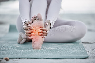 Buy stock photo Woman, foot pain and injury at beach after yoga practice, stretching or workout for health and wellness. Sports, pilates or female massage feet, fibromyalgia or muscle tension after exercise outdoors
