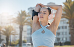 Woman, headphones and stretching arms in city for fitness workout, exercise wellness and training with audio podcast outdoor. Athlete person, listening to music and performance warm up ready for run