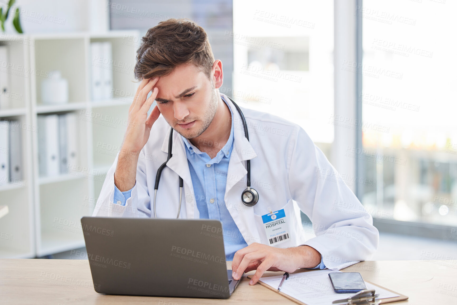 Buy stock photo Doctor, laptop and stress headache about bad news or diagnosis for medical professional in his office. Hospital, clinic and male gp specialist reading email and feeling upset with a migraine