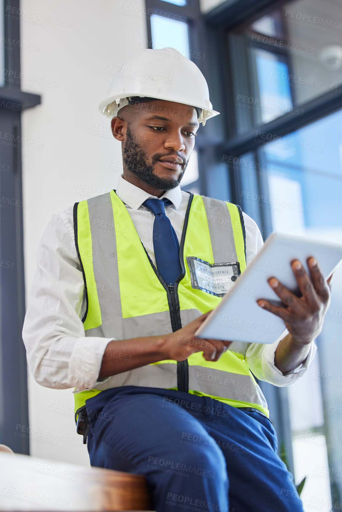 Buy stock photo Engineer manager, tablet and black man working on construction strategy plan, maintenance inspection and building online report. African man, architect contractor and site planner on digital tech