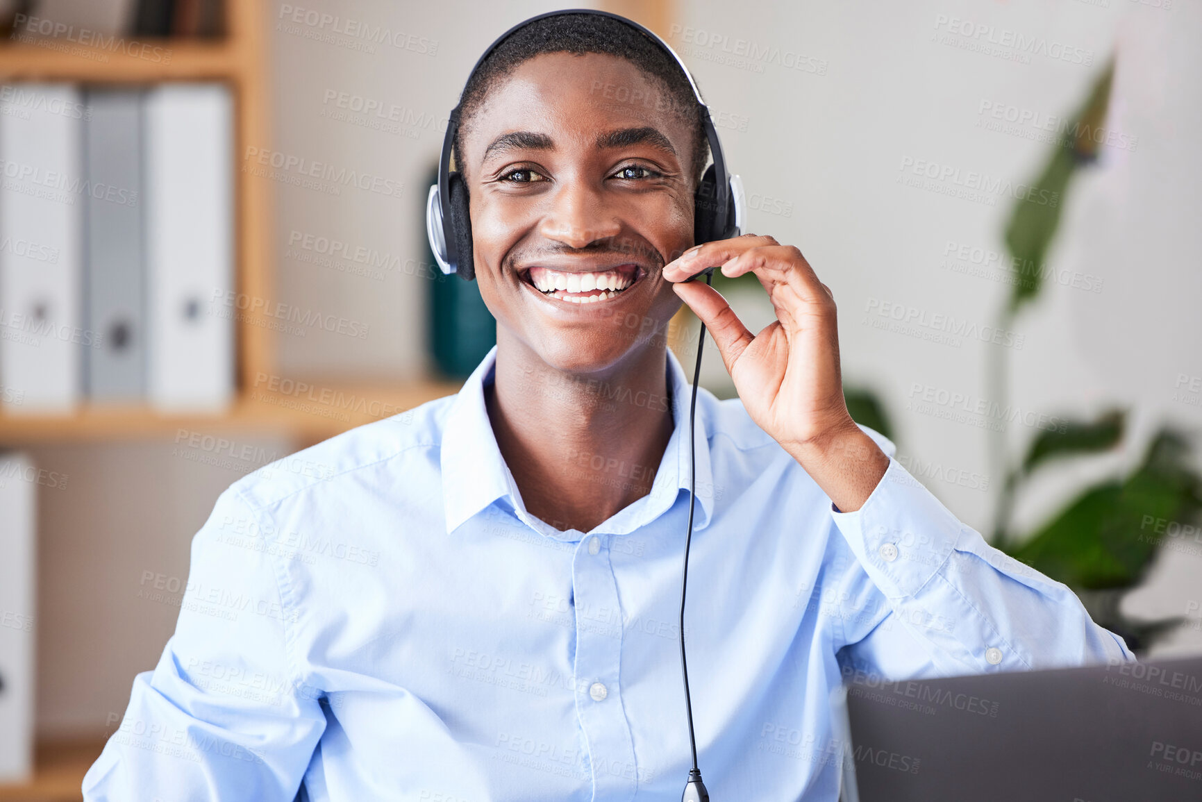 Buy stock photo Call center, consulting and smile with businessman in office for telemarketing, customer service and technical support.  Help desk, contact us and crm with black man and microphone for sales advisory