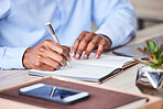 Business, man and writing in a notebook to plan a corporate strategy and ideas for development. Book, write and hand on paper to develop a professional idea while brainstorming at his desk