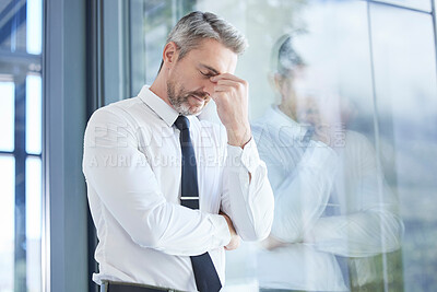 Buy stock photo Window, business man and stress with headache, burnout and overworked in office. Senior male, entrepreneur and ceo frustrated, mental health and leader with depression, pain and tired in workplace.