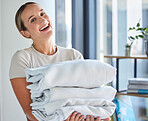 Woman, face or folded laundry in house, home or hotel in housekeeping, hygiene maintenance or healthcare wellness. Portrait, smile or happy maid and washing clothes, bed linen or hospitality cleaning