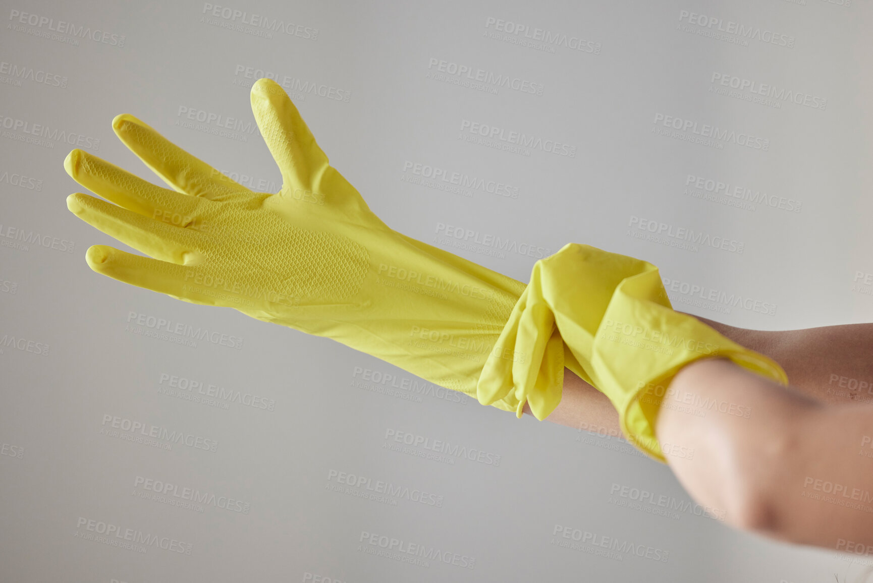 Buy stock photo Hands, yellow rubber gloves and cleaning woman ready for worker cleaning service, spring cleaning or housework in studio background. Maid, hygiene safety wellness and bacteria maintenance uniform
