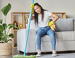 Cleaning, tired and mop with woman in living room for housekeeping, hygiene or disinfection. Pain, exhausted and fatigue with girl cleaner resting after domestic and tidy for dirt, bacteria or dust