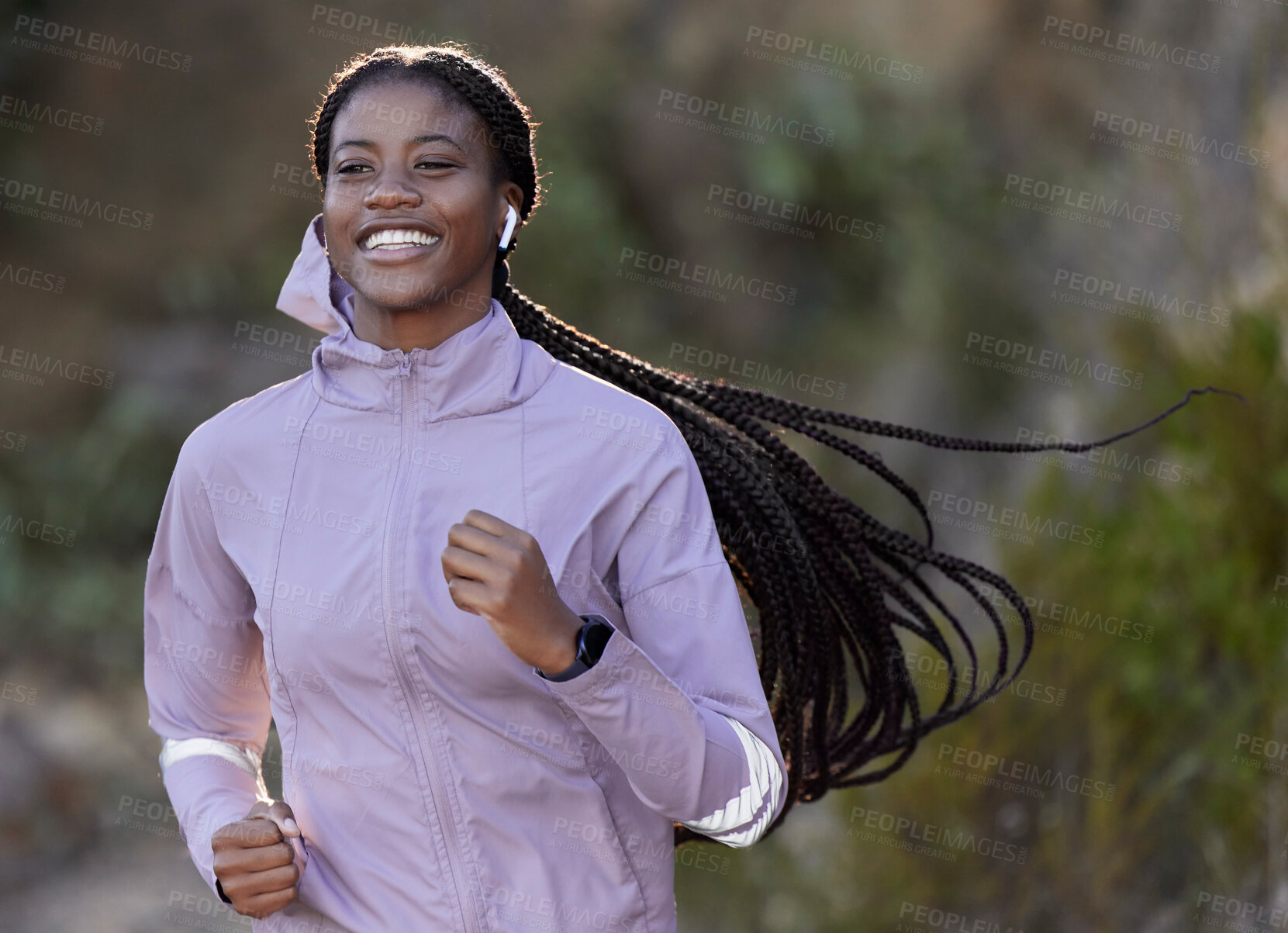 Buy stock photo Running, happy and black woman with music in nature, cardio fitness and sports health in mountains of Indonesia. Podcast, training and African athlete listening to radio while on a run in a park