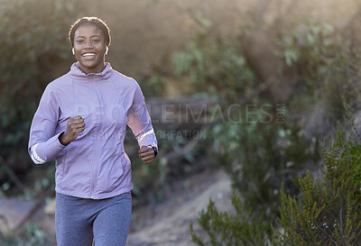 Buy stock photo Black woman, running and fitness of a runner happy about nature workout and sport. Training motivation, cardio and exercise for a marathon run on a mountain bush hiking path outdoor for health