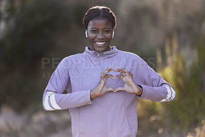 Buy stock photo Black woman, fitness and hands in heart gesture, sign or symbol in love for healthy cardio, exercise or workout in nature. Portrait of African American female showing hearty shape hand for wellness