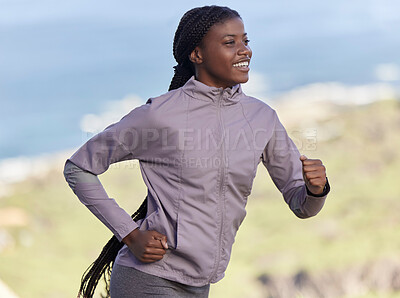 Buy stock photo Running, fitness and training with black woman in nature for hiking, marathon and endurance. Cardio, exercise and stamina with girl runner jogging on mountain path for challenge, performance and goal