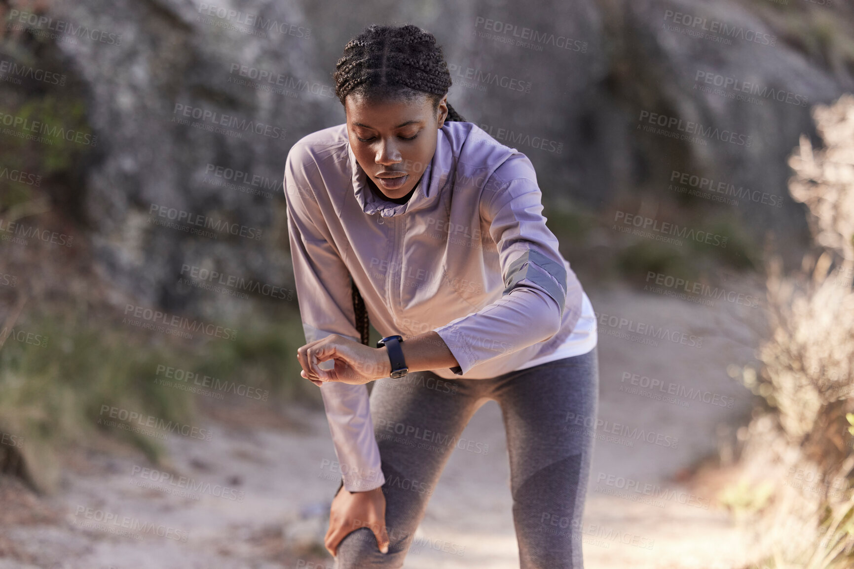 Buy stock photo Fitness, nature and woman with time on watch for running speed, progress check and steps monitor on smartwatch or digital technology. Runner, athlete or black woman in mountains training with a timer