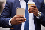 Businessman, hands and coffee with phone for communication on email, social media or networking. Travel, 5g and corporate black man on work commute with mobile app connection and latte drink.