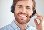 Call center, portrait and business man on a contact us, telemarketing and crm call with a smile. Happy web support consultant working on customer service, consulting and internet help desk job 