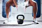 Man, legs and kettlebell with fitness and bodybuilder hands with powder, exercise in gym for bodybuilding, strong and muscle training. Workout, sports motivation and health wellness with performance 