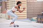 Black woman, fitness and squat training on rooftop for exercise wellness, body workout and healthy lifestyle motivation outdoor. African woman, muscles and strong legs or core with focus mindset