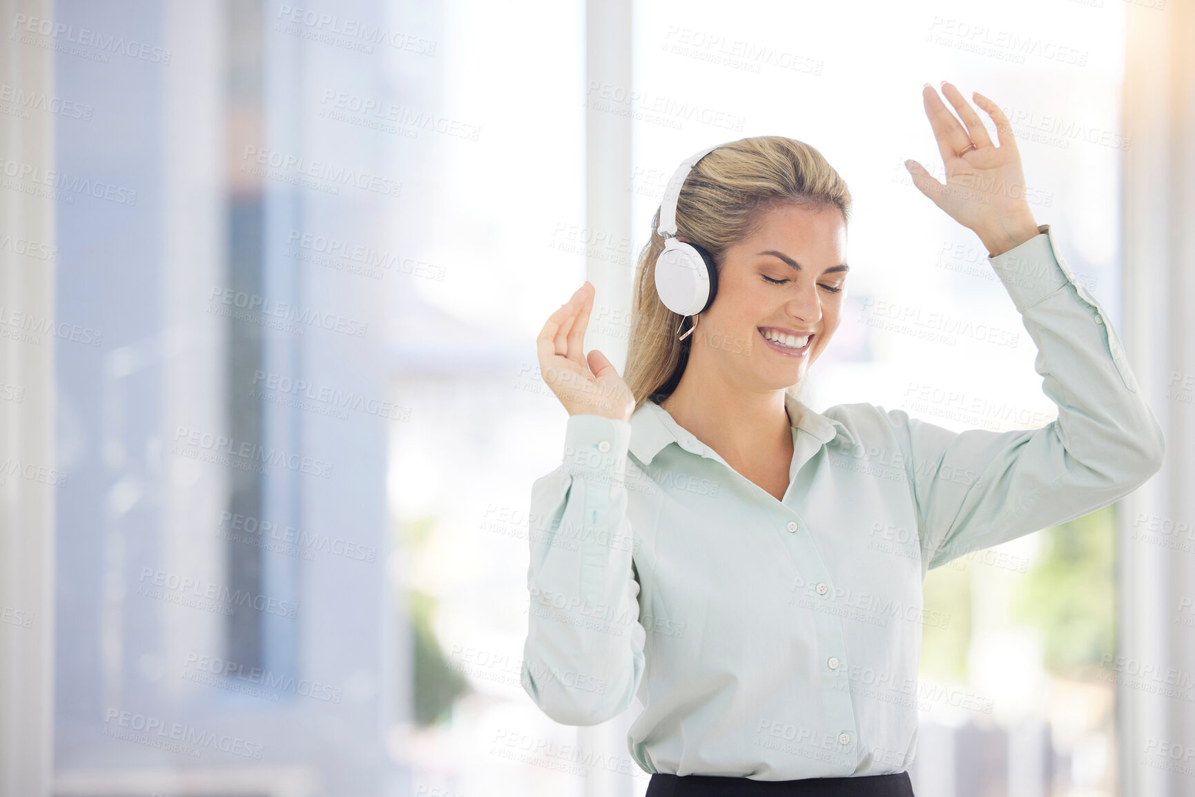 Buy stock photo Business woman, headphones and dance in office, relax or celebrate success. Female entrepreneur, ceo and lady with earphones for music, audio or radio for stress relief, dancing or smile in workplace