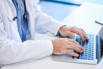 Doctor, laptop and hand typing email or prescription online for medical treatment in a clinic or hospital. Healthcare, medicine and keyboard with a cardiologist type a research report online
