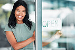 Open sign, black woman and small business owner of restaurant. Welcome, coffee shop and portrait of happy female entrepreneur from Nigeria in startup cafe ready for  service while standing at door.