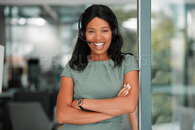 Buy stock photo Black woman, call center and smile while in a office for CRM, customer support and telemarketing sales with arms crossed as leader or manager. Portrait of a happy entrepreneur with consultant headset