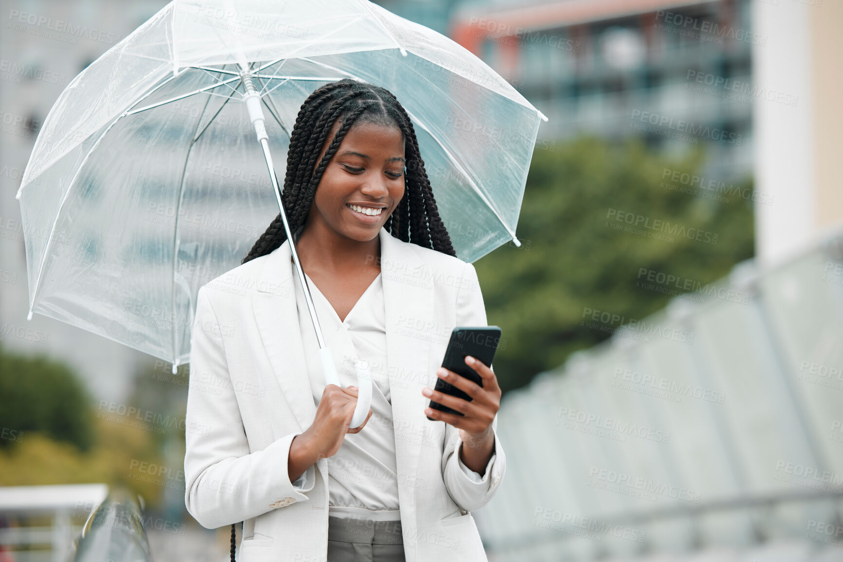 Buy stock photo Business, black woman and smartphone, city and rain with umbrella, insurance with communication and technology. Professional, urban and commute to work, online with smile and female worker in Chicago