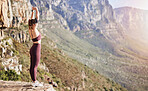 Hiking, stretching and woman in mountains for fitness, summer exercise and training adventure in Portugal. Warm up, sports and girl on a mountain cliff for a walk, workout and wellness in nature