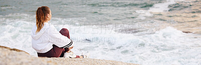 Buy stock photo Beach, woman and relax for peace and thinking on rock for calm positive mindset, watching ocean waves or freedom vision outdoor. Zen meditation, mindfulness and mental health at Sydney seaside 