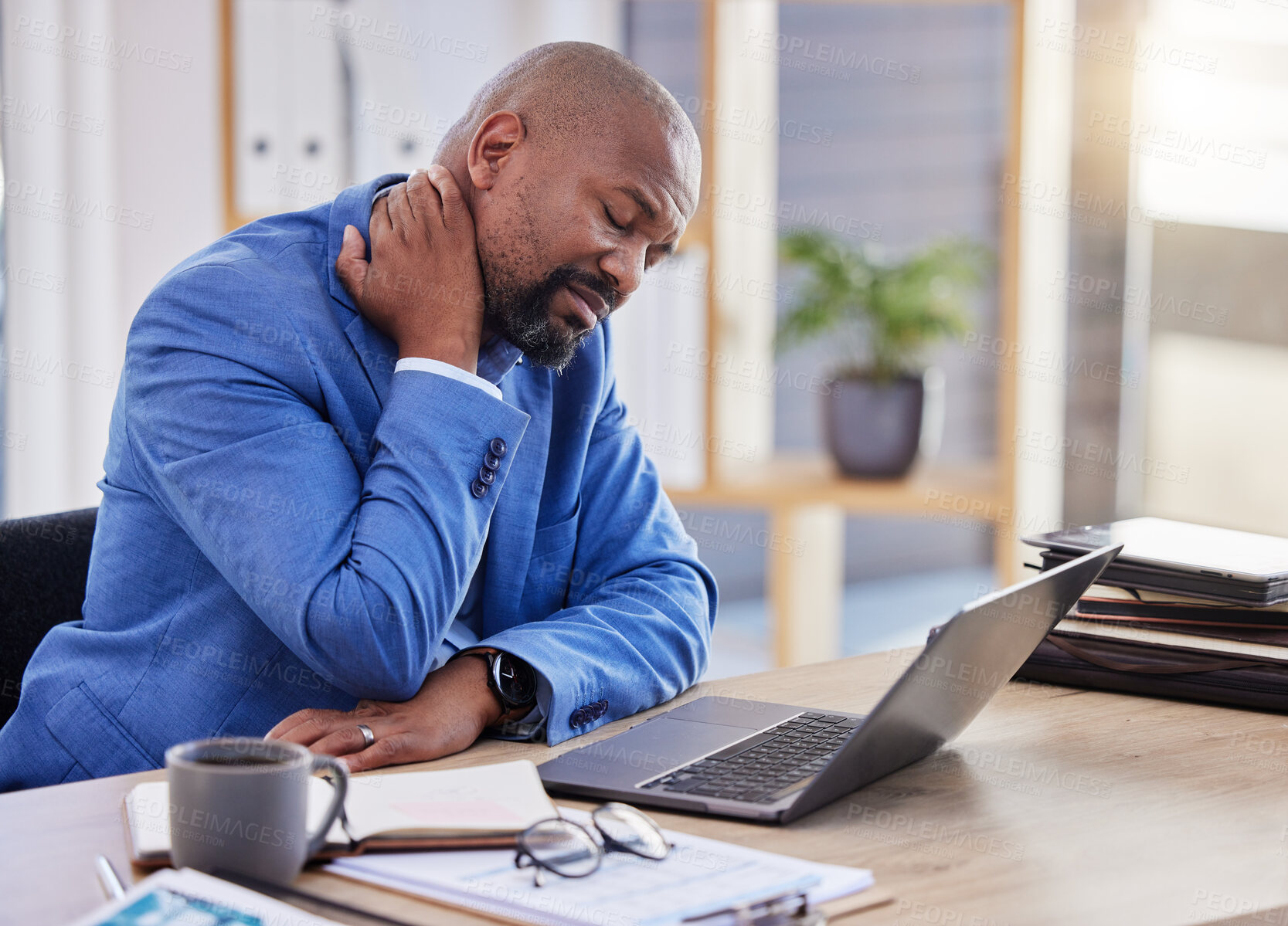 Buy stock photo Black man , stress and tired burnout with neck pain in the office due to bad posture and uncomfortable chair. Fatigue, problem or frustrated worker annoyed with body injury or muscle backache at work